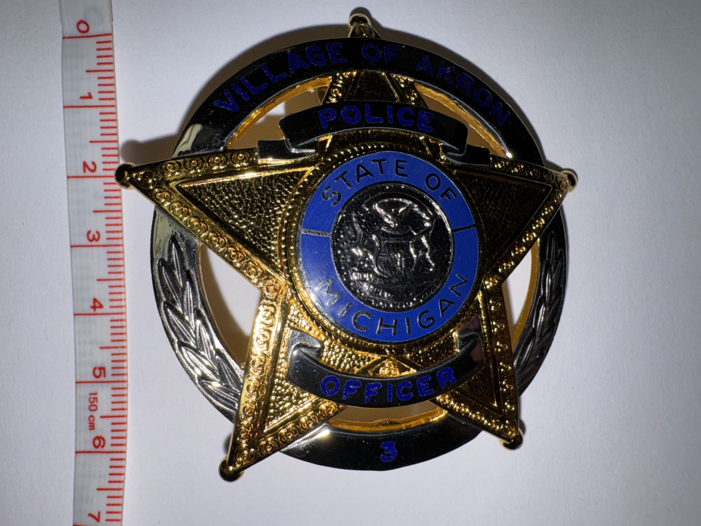 VILLAGE OF AKRON BADGE
